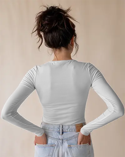White Long Sleeve Back Print Mockup Female Model In High Waisted Jeans Hands On Hips Neutral Background