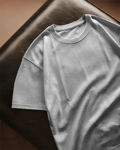 White Tshirt Mockup Flat Lay On Leather Chair Soft Shadows Natural Warm Lighting Custom Design Template