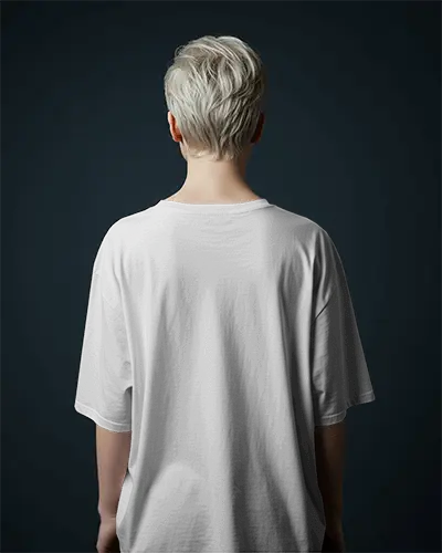 Back View Tshirt Mockup Short Platinum Hair Model Against Dark Studio Background