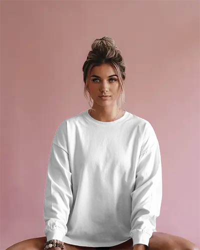 Soft Pink Background Long Sleeve Tshirt Mockup Female Model Sitting Calmly