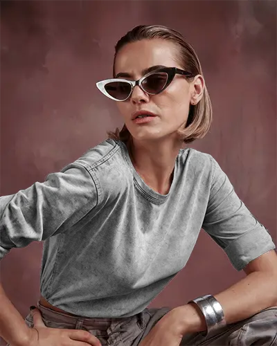 Acid Wash Long Sleeve Mockup Female Model In Edgy Styled Pose Against Red Backdrop