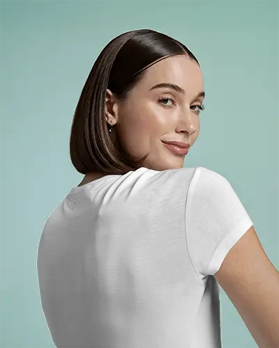 Back View Tshirt Mockup Female Model In White Tee On Soft Aqua Background