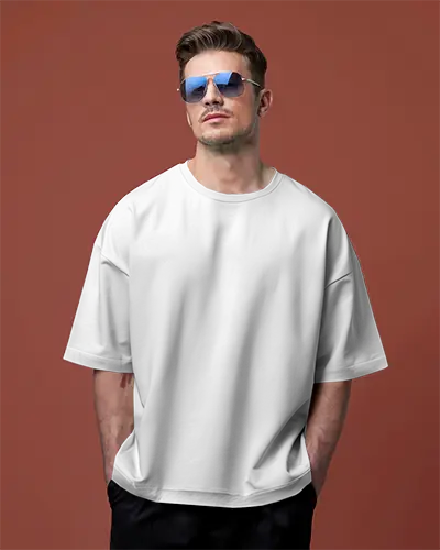 Oversized Tshirt Mockup Male Model Wearing Sunglasses Standing Against Burnt Orange Background