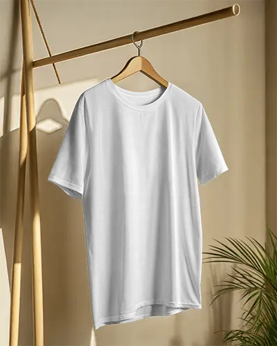 Clean White Tshirt Mockup Hanging On Wooden Stand In Natural Light Studio
