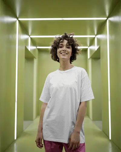Futuristic Neon Lit Hallway Tshirt Mockup With Smiling Female Model In Casual Pose Modern Vibes And Bold Lighting
