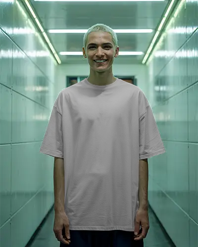 Urban T Shirt Mockup Male Model In Oversized Tee Standing In Glowing Green Tunnel Moody And Modern Streetwear Vibes