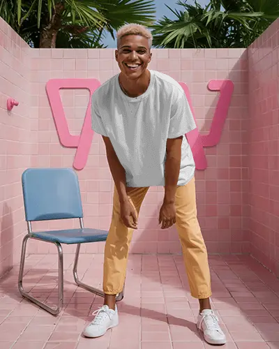 Playful Pink Tile Tshirt Mockup With Smiling Model In Vibrant Outdoor Setting And Sunny Tropical Vibes