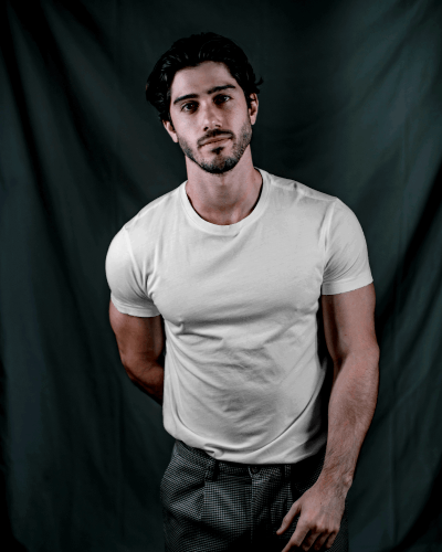 Model In Tshirt Mockup In Dark Studio