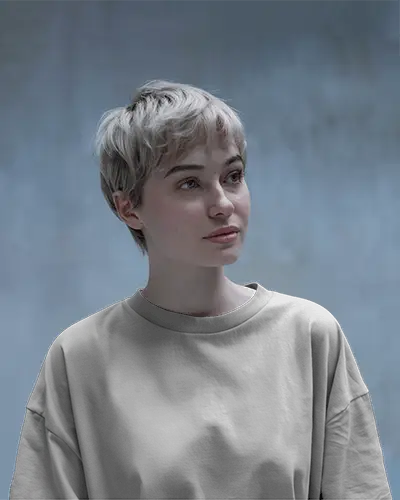 Modern Aesthetic T Shirt Mockup Female Model Front View In Minimal Background