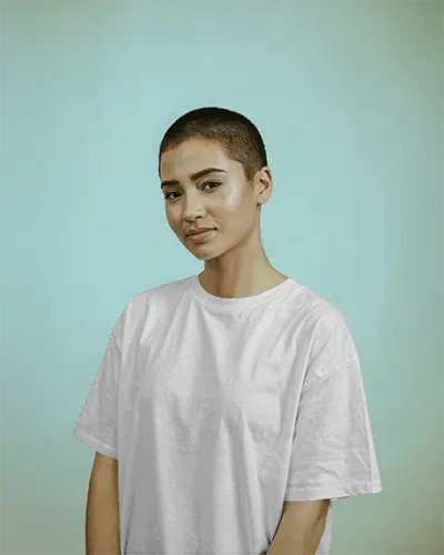 Pastel Studio T Shirt Mockup Female Model With Buzzcut In Tshirt Minimal Background