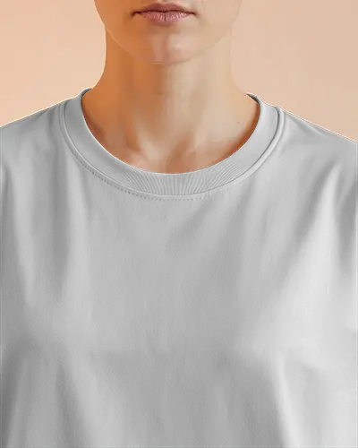 Zoomed In Tshirt Mockup Upper Body Shot Of Woman Wearing Basic Light Gray Half Sleeve Tee