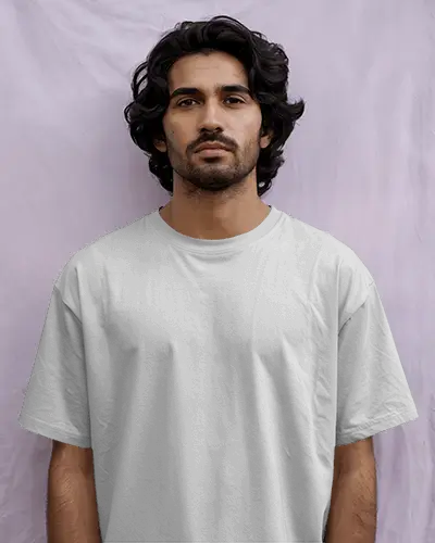 Youthful Charm T Shirt Mockup Model In Comfortable Tshirt Against Light Purple Wall