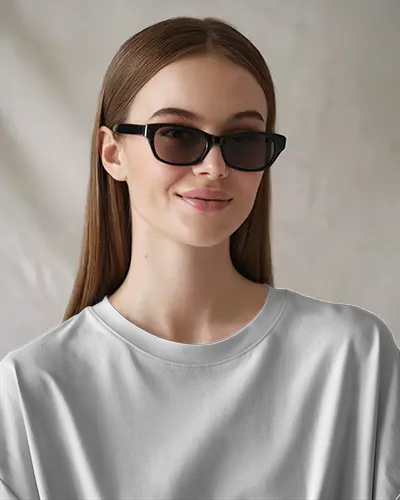 Studio Closeup T Shirt Mockup Female Model Wearing Black Sunglasses Subtle Smile Minimal Soft Lighting