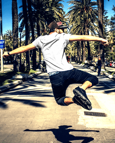 Tshirt Mockup Of Man Jumping In Excitement
