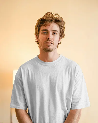 Neutral Background Tshirt Mockup Front View Of Young Man With Soft Expression