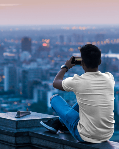 Tshirt Mockup Of Man Clicking Photo