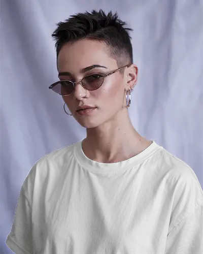 White Crew Neck T Shirt Mockup Front Angle View On Person With Textured Pixie Cut Slim Sunglasses And Stacked Hoop Earrings Soft Purple Draped Backdrop Modern And Stylish Vibe