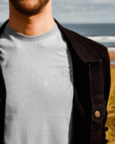 Closeup Tshirt Mockup Worn By Man Below Black Jacket