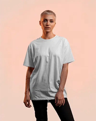 Minimalist Studio Tshirt Mockup Short Haired Female Model In Soft Peach Background