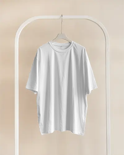 Hanging White T Shirt Mockup On Minimal Arch Rack With Soft Beige Background