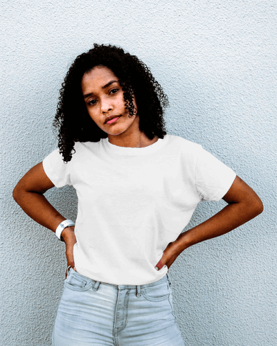 Woman Curly Hair Tshirt Mockup In Front Of Textured Wall For Graphic Design