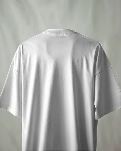 Back View Boxy White Tshirt Mockup Hanging Against Light Grey Background Soft Studio Light