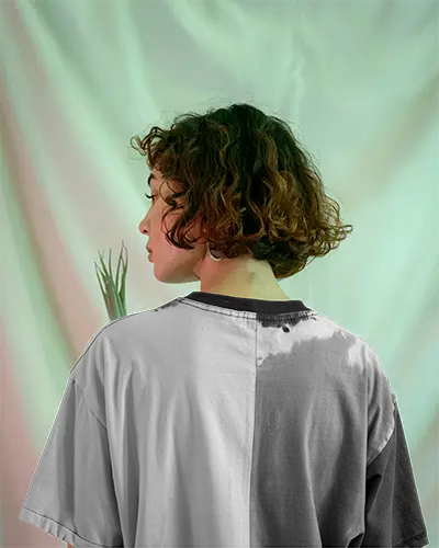 Back View Acid Wash Tshirt Mockup Female Model Curly Hair Two Tone Dye Effect Soft Light