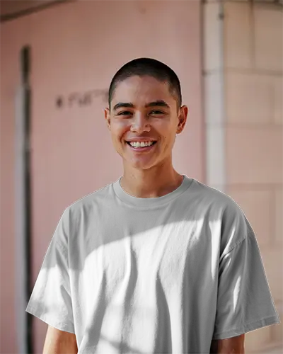 Outdoor Daylight White Tshirt Mockup Smiling Model In Soft Pink Urban Background Natural Light On Tee Great For Lifestyle Brand Or Summer Campaign