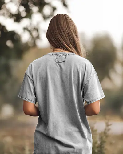 Backview Acidwash Tshirt Mockup Female Model In Forest Path Natural Light Stylish And Vintage Design Showcase Perfect For Outdoor Branding