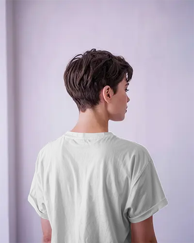 Back View White Tshirt Mockup Short Haired Model Facing Wall Minimal Lavender Studio Soft Lighting Modern Look For Brand Design Placement