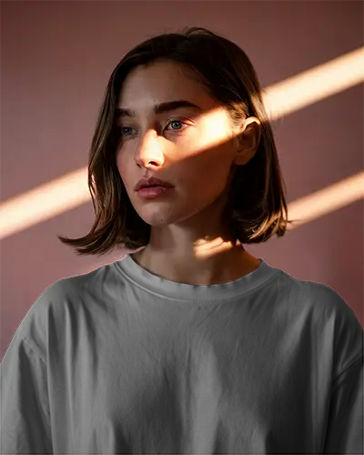 Dramatic Lighting Tshirt Mockup Female Model Facing Forward Sunbeam Across Face Moody Background Perfect For Elegant Design Showcase