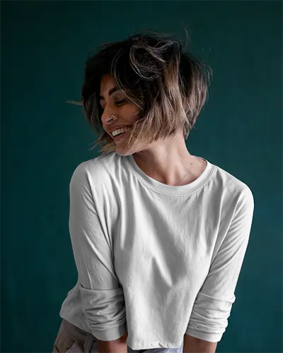 Studio Smile Longsleeve Tshirt Mockup Woman In White Tee Against Dark Green Background Happy Fashion Moment