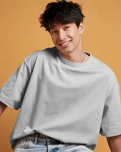 Cheerful Smile Tshirt Mockup Male Model In White Tee On Warm Orange Background Casual Pose