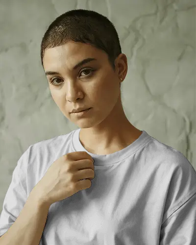 Closeup Portrait T Shirt Mockup Buzzcut Model In Soft Diffused Lighting And Concrete Texture Background
