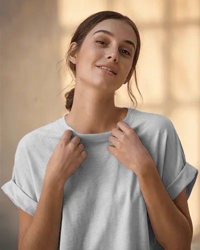 Minimalist T Shirt Mockup Female Model Smiling With Clear Design Space Ready For Custom Graphic Art