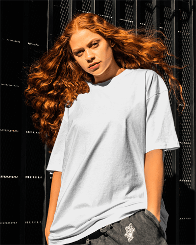 Genz Woman Posing In Oversized Tshirt Mockup