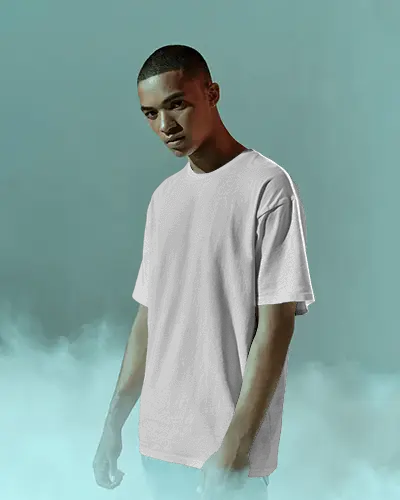 Dramatic Fog Backdrop Tshirt Mockup Young Man Posing In Soft Matte Light