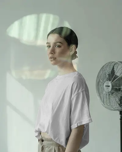 Side Profile Female Model T Shirt Mockup With Casual Attire And Thoughtful Expression Under Bright Natural Lighting