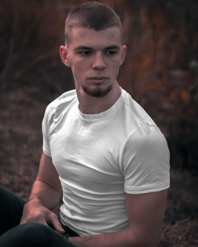 Lean Male In A Forest Wearing Tshirt Mockup
