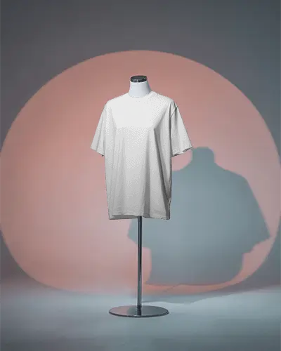 Elevated Apparel Display T Shirt Mockup Featuring Minimal Metal Mannequin In Color Washed Studio Background
