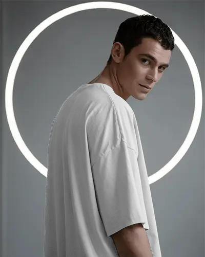 Stylized Male Tshirt Mockup Profile View Under Glowing Circle Light Creative Editorial Portrait Modern Gray Tones
