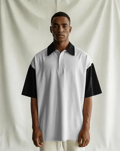 Front Facing Polo Tshirt Mockup Man In Two Tone Shirt Against Cream Draped Fabric Backdrop