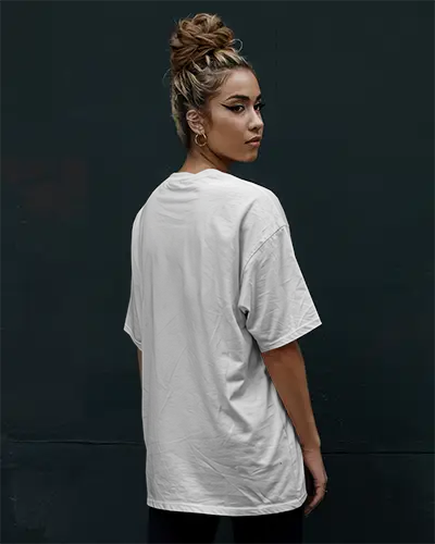 White Tshirt Mockup Female Model Outdoors Back View Against Dark Urban Wall Modern Casual Look Confident Expression
