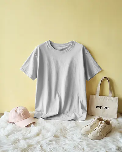 Yellow Wall Flatlay T Shirt Mockup With Accessories Pink Cap Canvas Tote And Sneakers On White Rug In Cozy Lifestyle Setting