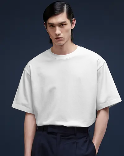 Studio Lit Tshirt Mockup Male Model Facing Front In Clean Minimal Navy Background Modern And Sleek Style