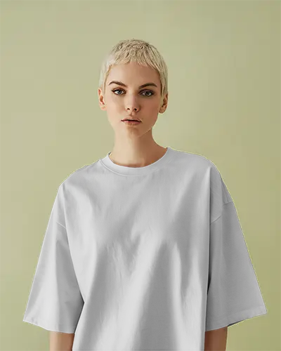 Studio Tshirt Mockup Woman Short Blonde Hair Facing Camera Soft Light Green Backdrop Clean Look