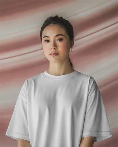 Studio Tshirt Mockup Woman In White Tee With Soft Focus Pink Swirled Backdrop Calm Expression