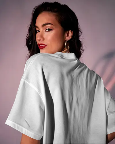 Studio Backview Tshirt Mockup Woman In White Tee Gold Hoops Soft Pink Lighting Bold Look