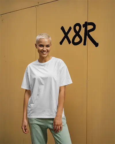 Urban Tee Mockup Smiling Woman Blonde Hair Graffiti Wall Background Outdoor Scene Design Template