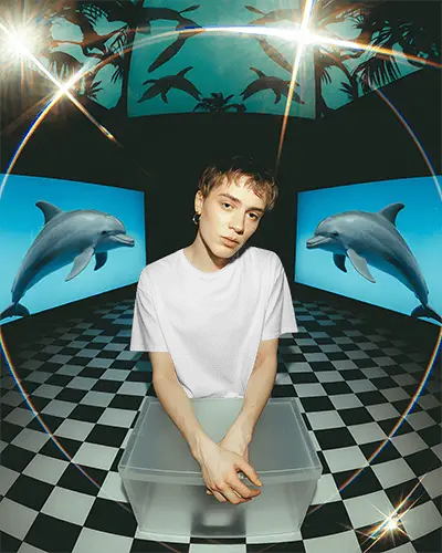 Futuristic Interior T Shirt Mockup Male Model Standing In Immersive Digital Aquatic Environment